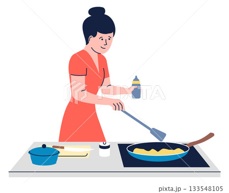 A woman is cooking breakfast in a kitchen 133548105