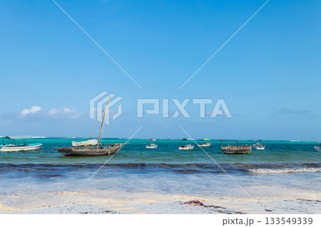 Boats in the Indian ocean on Zanzibar, Tanzania Boats in the Indian ocean on Zanzibar, Tanzania 133549339