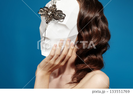Beautiful Woman Wearing Mask. Mysterious Girl with Nice Masquerade Accessories. Carnival, Halloween or Christmas Style 133551769