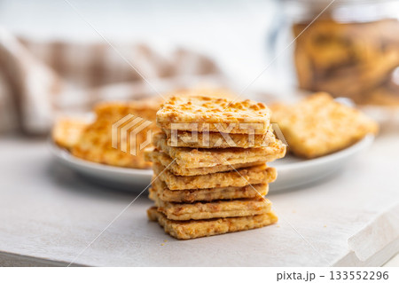 Crunchy salted crackers on whiten table. 133552296