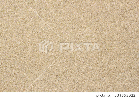 Uniform beige granular surface creates soft natural texture resembling fine sand. Concept of texture minimalism, texture pattern, softness form, calm neutral background Uniform beige granular surface creates soft natural texture resembling fine sand. Concept of texture minimalism, texture pattern, softness form, calm neutral background 133553922