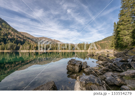 Summer time at romantic forest Lake Obernberg scenic mountain lakes landscape in Austria, Tyrol 133554279