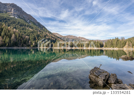 Summer time at romantic forest Lake Obernberg scenic mountain lakes landscape in Austria, Tyrol Summer time at romantic forest Lake Obernberg scenic mountain lakes landscape in Austria, Tyrol 133554281