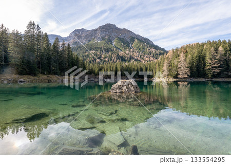 Summer time at romantic forest Lake Obernberg scenic mountain lakes landscape in Austria, Tyrol 133554295
