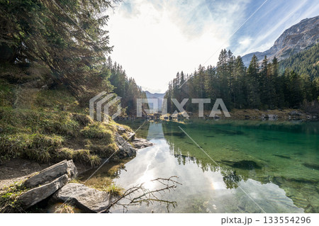 Summer time at romantic forest Lake Obernberg scenic mountain lakes landscape in Austria, Tyrol Summer time at romantic forest Lake Obernberg scenic mountain lakes landscape in Austria, Tyrol 133554296