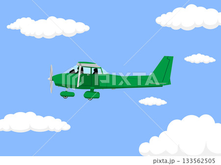 空を飛ぶプロペラ飛行機 133562505