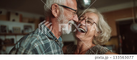 Happy senior couple elderly man elderly woman laugh smile affection close up candid indoor warm light celebrate love Happy senior couple elderly man elderly woman laugh smile affection close up candid indoor warm light celebrate love 133563077