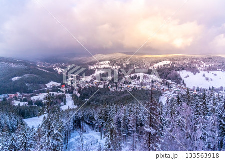 Winter scenic view from Tanvaldsky Spicak Mountain. Rural landscape with Jiretin and Albrechtice villages, Jizera Mountains, Czech Republic 133563918
