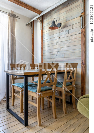 Wooden Dining Area with Soft Cushioned Chairs Wooden Dining Area with Soft Cushioned Chairs 133565125