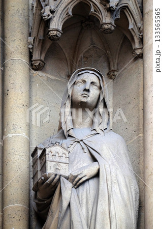 Statue of Saint on the portal of the Basilica of Saint Clotilde in Paris, France 133565565