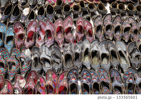 Display of traditional shoes at the street market in Jaipur, Rajasthan, India 133565601