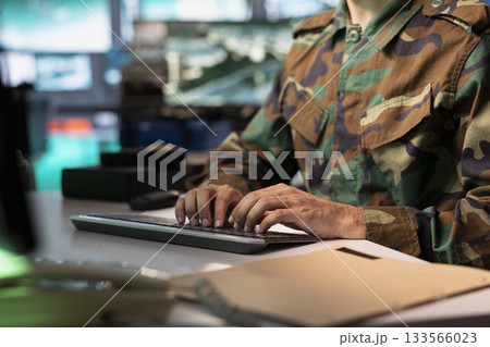 Counterintelligence agent combating organized crime and terrorism using detection system. Intelligence corps officer protecting national sovereignty by tracking terrorists entering country Counterintelligence agent combating organized crime and terrorism using detection system. Intelligence corps officer protecting national sovereignty by tracking terrorists entering country 133566023