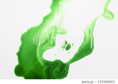 Fresh green liquid spill or splat with bubbles on a white background Fresh green liquid spill or splat with bubbles on a white background 133568061