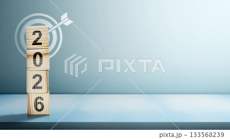 Stack of wooden cubes with the number 2026 with an arrow on a target board on a white background. Happy New Year concept or Celebration. 2026 Goal Target 133568239
