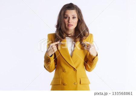Questioning Businesswoman Pointing to Herself 133568861