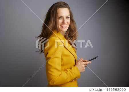 Approachable Professional with Smartphone 133568900