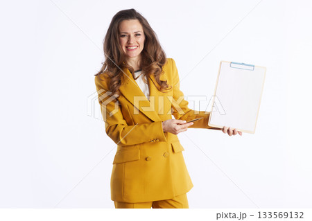 Businesswoman Presenting with Clipboard 133569132