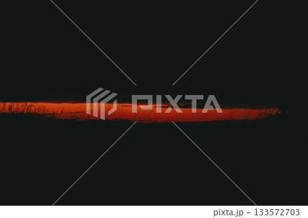 Dramatic sunset over a field of tall grass. The silhouette of grass, red orange sunset, creating a striking contrast in the sky. Wild grasses at night Dramatic sunset over a field of tall grass. The silhouette of grass, red orange sunset, creating a striking contrast in the sky. Wild grasses at night 133572703