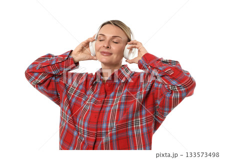 Person listens to music while wearing headphones, isolated on white, PNG Person listens to music while wearing headphones, isolated on white, PNG 133573498