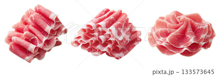 Set of fresh raw meat cuts, thin sliced roll pork, isolated on transparent background. Fresh meat for cooking, food preparation, and advertisement. 133573645
