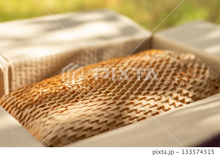 Eco friendly brown paper honeycomb wrap for product packaging parcel carton box 133574315