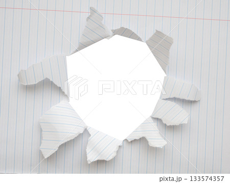 Torn ripped paper hole isolated on white background Torn ripped paper hole isolated on white background 133574357
