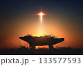 A large star in the shape of a cross illuminates the Saint Jesus in a manger, a Christmas background symbolizing the birth of baby Jesus and his death on the cross. 133577593