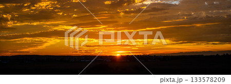 Beautiful sunset cloudscape in the evening. Natural background photography. 133578209