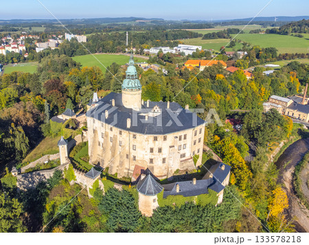 Chateau and Castle Frydlant on sunny autumn day. Frydlant v Cechach, Czech Republic. Aerial view from drone. 133578218
