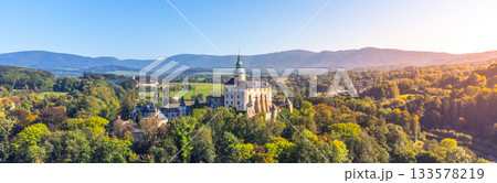 Chateau and Castle Frydlant on sunny autumn day. Frydlant v Cechach, Czech Republic. Aerial view from drone. 133578219