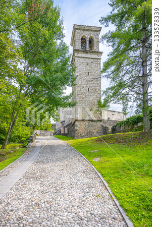Belltower of St Peters Church. Castle of Ragogna at Tagliamento River near Pinzano, Friuli, Italy Belltower of St Peters Church. Castle of Ragogna at Tagliamento River near Pinzano, Friuli, Italy 133578339