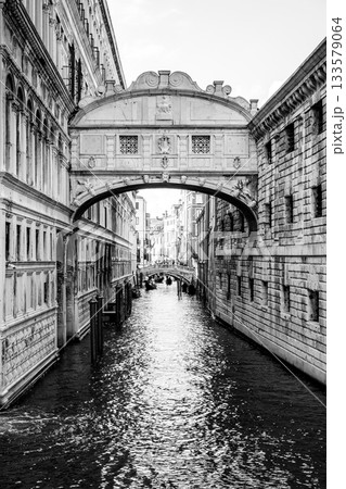 Bridge of Sighs, Italian: Ponte dei Sospiri. Small bridge made of white limestone over the Rio di Palazzo. Connects the New Prison and Doge's Palace. Black and white image. 133579064