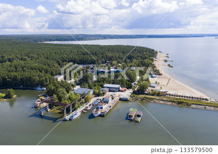 Aerial view of the pier, beach and endless forest on Ob River in summer, near Novosibirsk, Russia 133579500