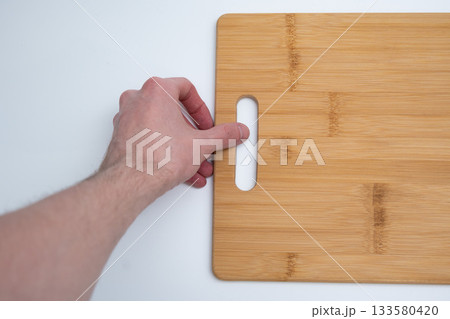 Bamboo Cutting Board with Handle on White 133580420