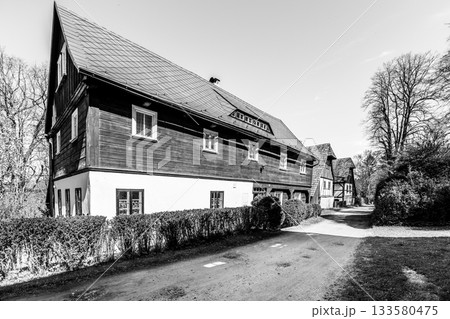 Traditional half-timbered house in rural village of Lusatian Mountains, Czech Republic Traditional half-timbered house in rural village of Lusatian Mountains, Czech Republic 133580475