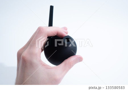Black Rubber Enema Bulb on White Background 133580583