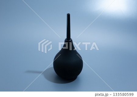 Black Rubber Enema Bulb on gray Background Black Rubber Enema Bulb on gray Background 133580599