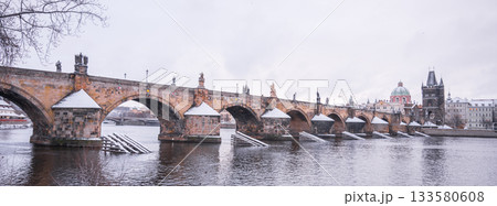 Historical Charles Bridge, Czech: Karluv most, over Vltava River in winter. Prague, Czech Republic. Historical Charles Bridge, Czech: Karluv most, over Vltava River in winter. Prague, Czech Republic. 133580608