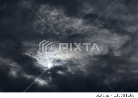 A dramatic dark overcast sky before the storm with thick clouds 133581169