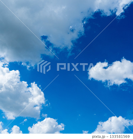 sky is blue and clear with no clouds. The sky is very bright and the sun is shining 133581569