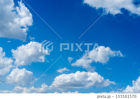 sky is blue and clear with no clouds. The sky is very bright and the sun is shining 133581570