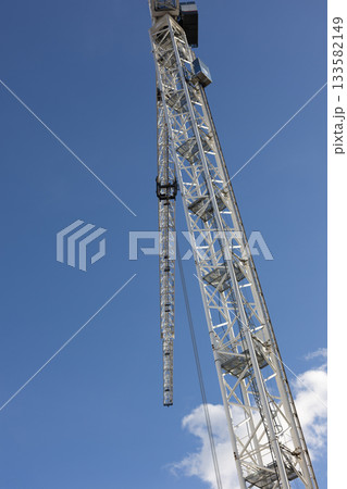 Construction Crane Against Blue Sky 133582149