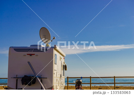 Satellite dish on roof of caravan 133583063