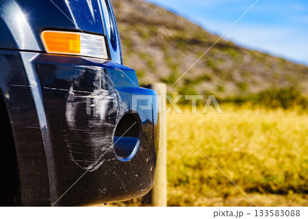 Rear bumper of black car get damaged by accident. 133583088