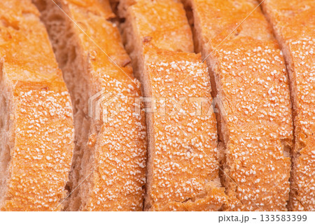 Sliced buckwheat bread as a background macro photo. 133583399