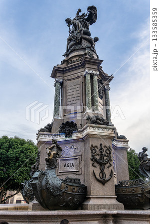 Largo Sao Sebastiao Square in Manaus, Amazonas, Brazil in front of the Teatro Amazonas with a fountain in the center. Largo Sao Sebastiao Square in Manaus, Amazonas, Brazil in front of the Teatro Amazonas with a fountain in the center. 133585359