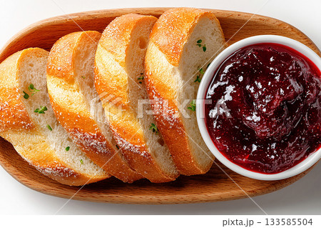 Delicious breakfast. Rustic farmhouse breakfast with homemade jam and fresh baked bread. Top view. Delicious breakfast. Rustic farmhouse breakfast with homemade jam and fresh baked bread. Top view. 133585504