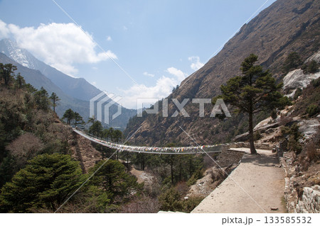 Imja river suspension bridge view along EBC trek, Nepal Imja river suspension bridge view along EBC trek, Nepal 133585532