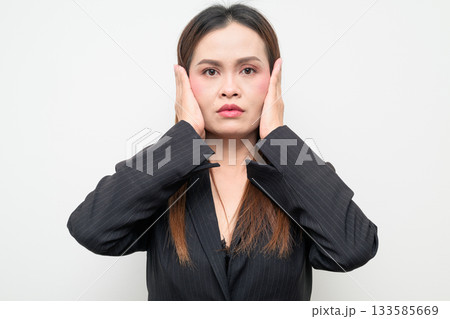 Asian Business Woman Hands Covering Ears Studio Portrait on White Background Asian Business Woman Hands Covering Ears Studio Portrait on White Background 133585669