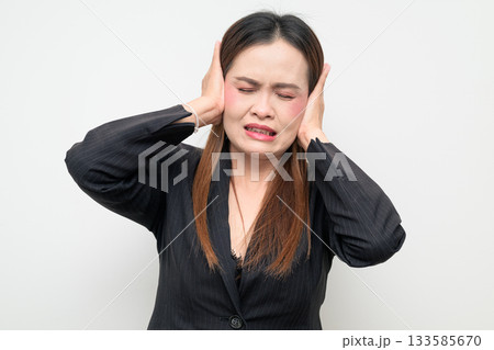 Asian Business Woman Hands Covering Ears Studio Portrait on White Background Asian Business Woman Hands Covering Ears Studio Portrait on White Background 133585670